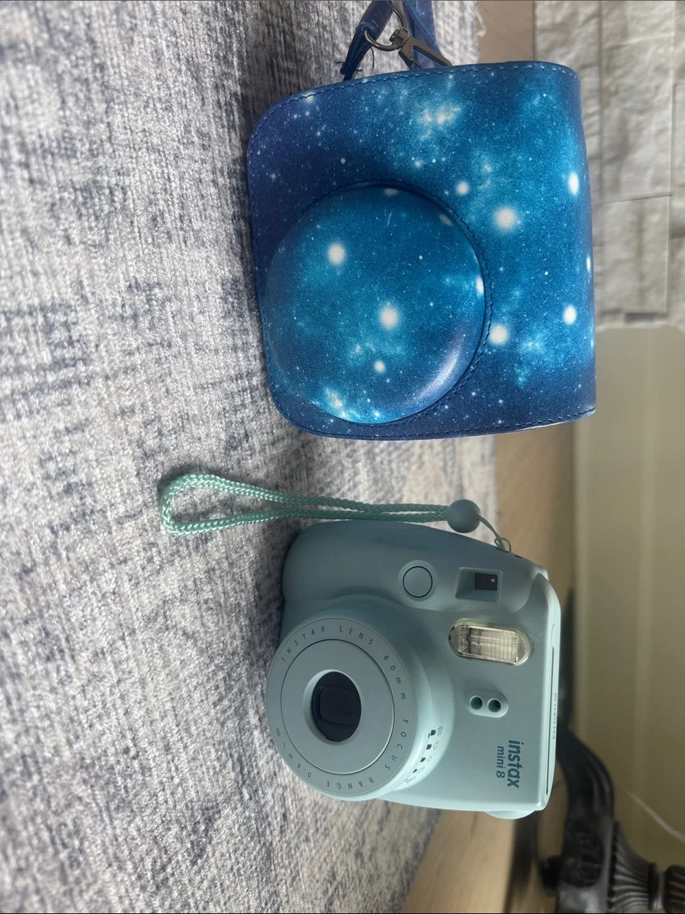Fujifilm Instax Camera with Galaxy Blue Case and Strap
